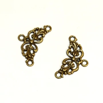 Bronz színű sarokdisz, mérete: 2,5x1,5 cm, 2 db/cs