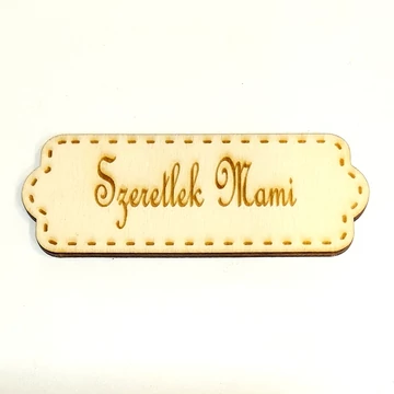 Kerekitett sarkú táblácska 'Szeretlek Mami' felirattal. Mérete: 8x3 cm
