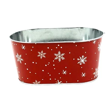 Karácsonyi fém kosár, piros alapon fehér hópelyhes. Mérete: 19,5x11x9,5 cm