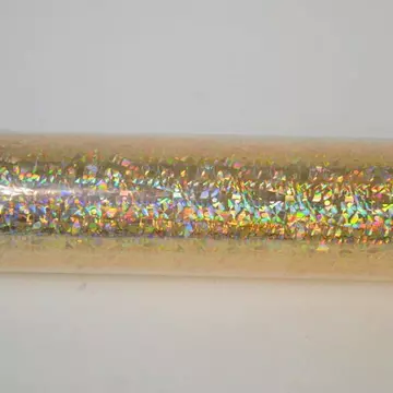 Transzfer és hőfólia tekercs, hologram szemcsés, arany. Mérete: 12x500 cm
